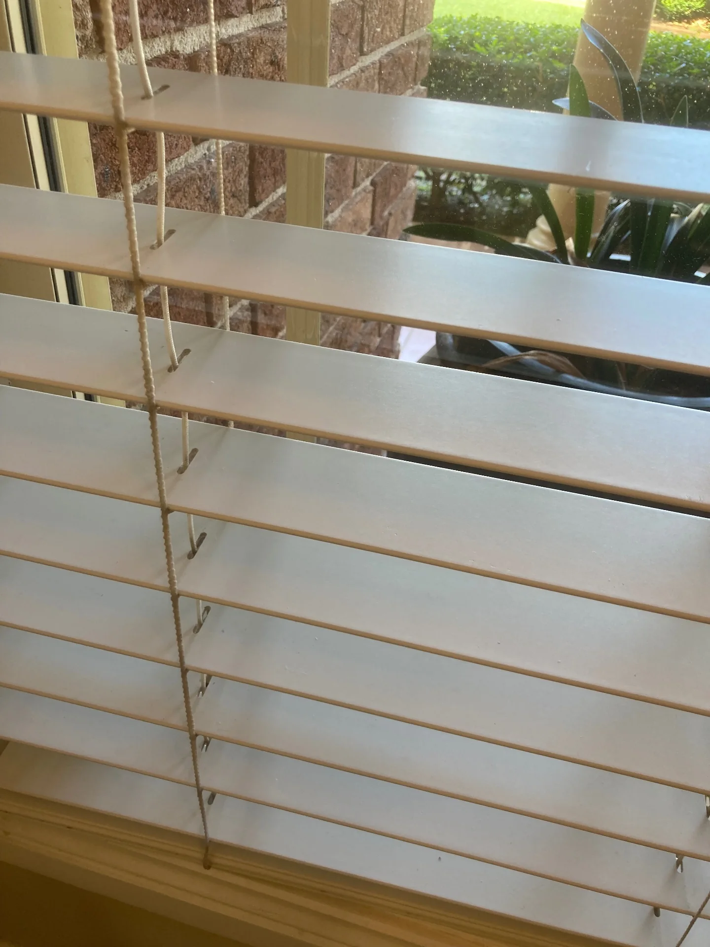 Same window blinds clean and bright after slat-by-slat hand cleaning by Beheli Group, St George
